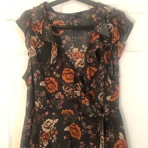 Floral short sleeved wrap around top